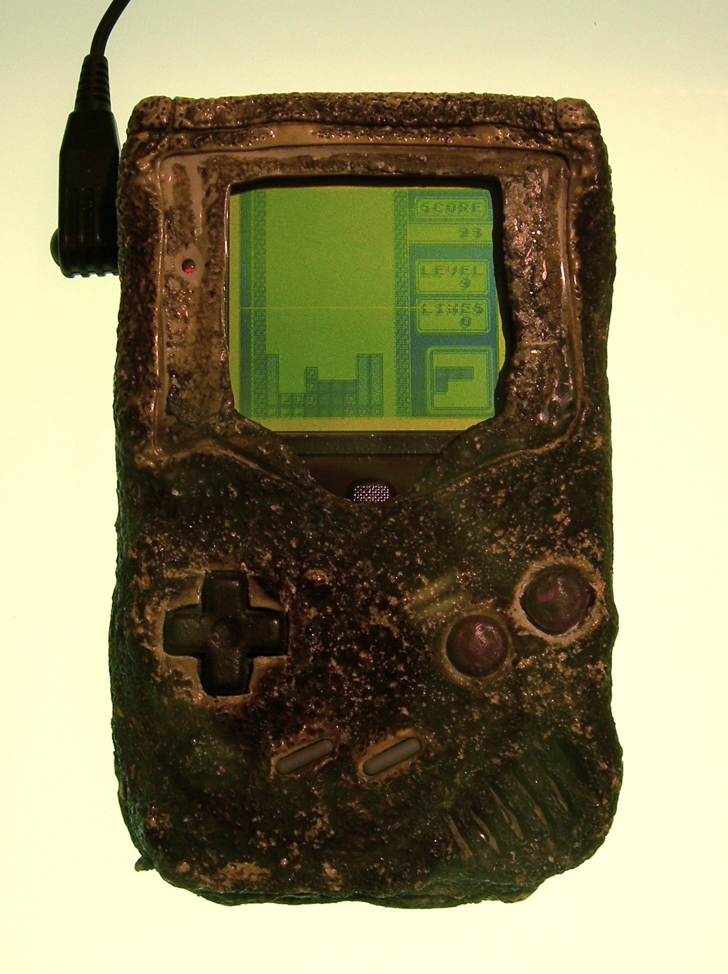 A Game Boy damaged in the gulf war and still capable of playing Tetris